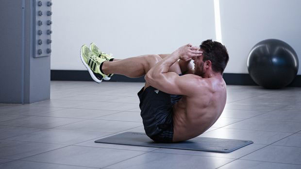 Скручивания на полу с поднятыми коленями